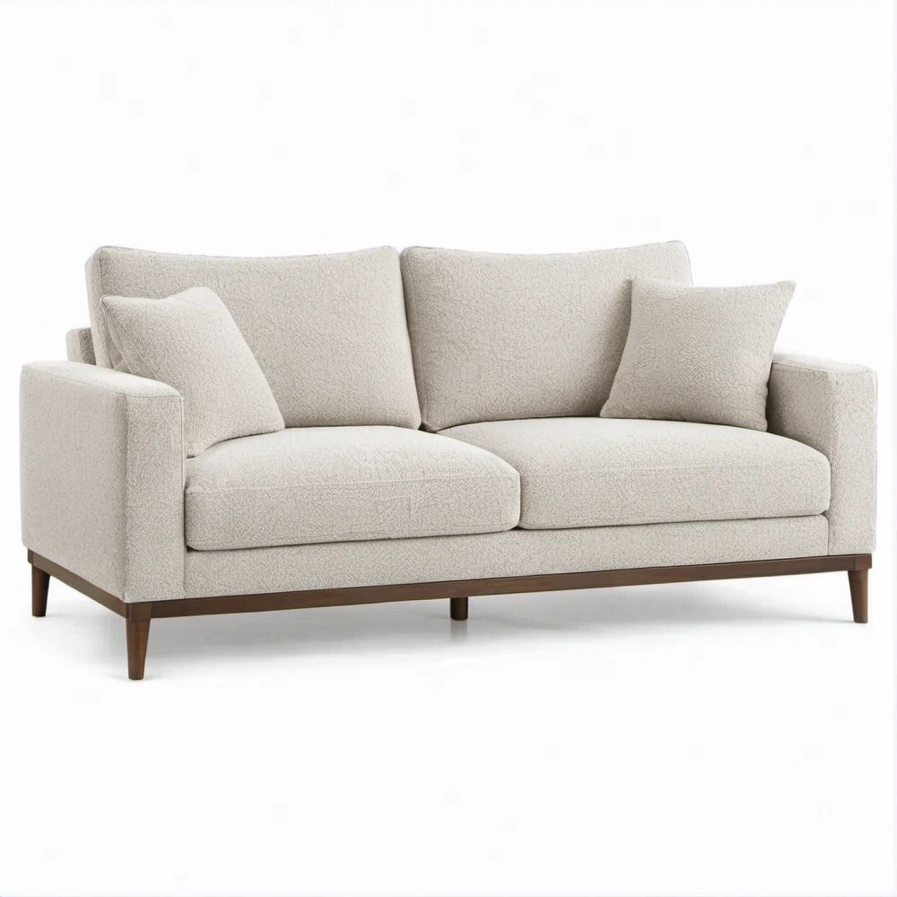 Kremowa sofa bouclé z ciemnobrązowymi nogami, 180 x 90 x 85 cm